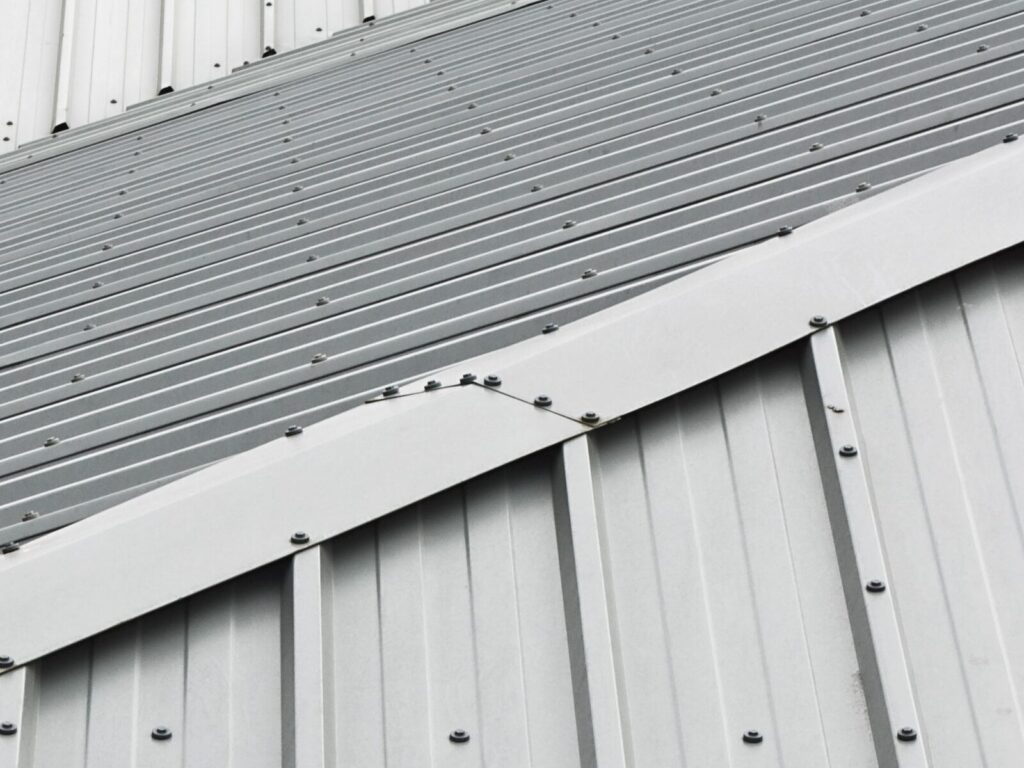 Metal sloping roof with visible bolts