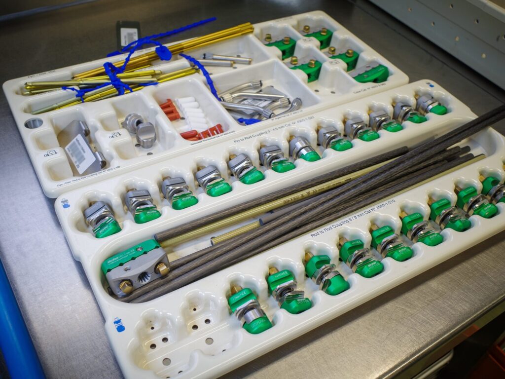 Two trays of external skeletal fixation device (ESFD) equipment