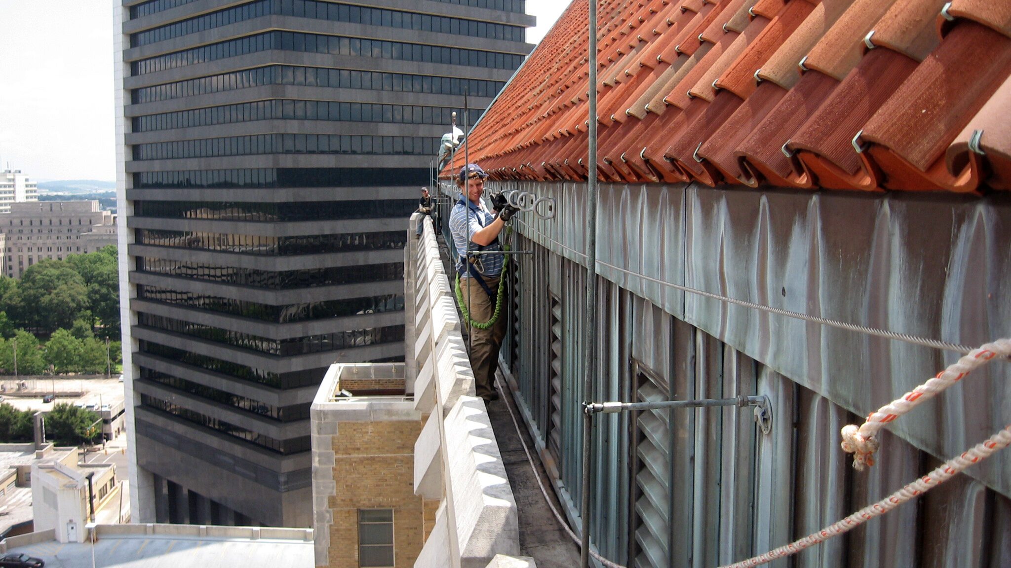 Technician on Top of Building, Secured by Horizontal Lifeline