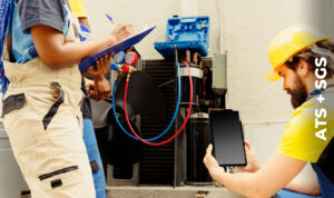 Two technicians reviewing equipment condition